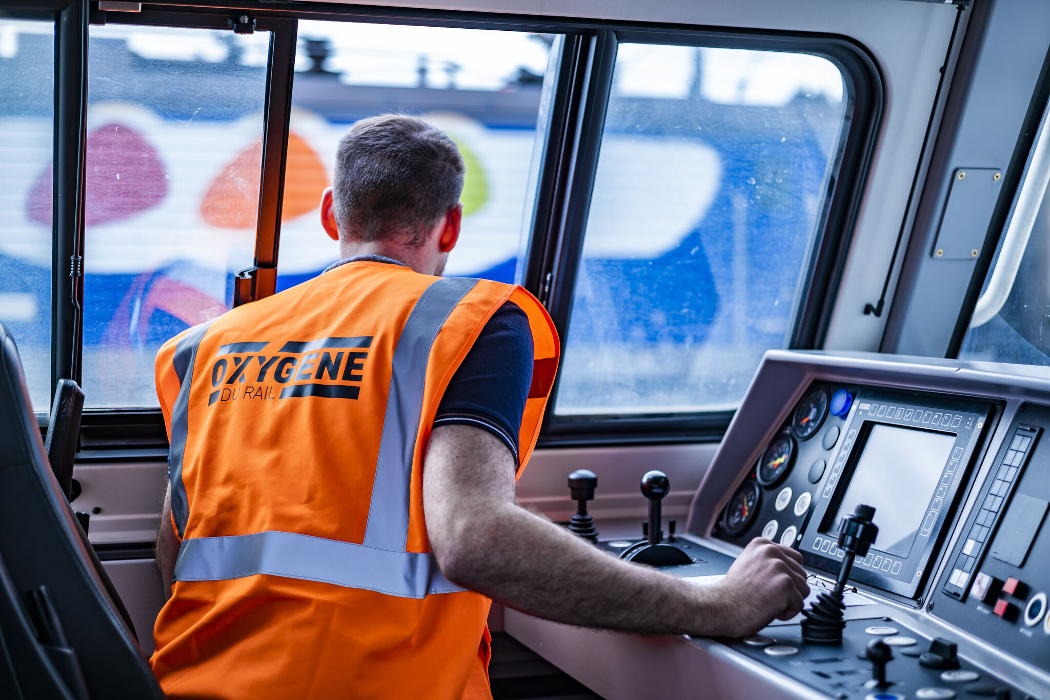 [Image d'un conducteur de train]